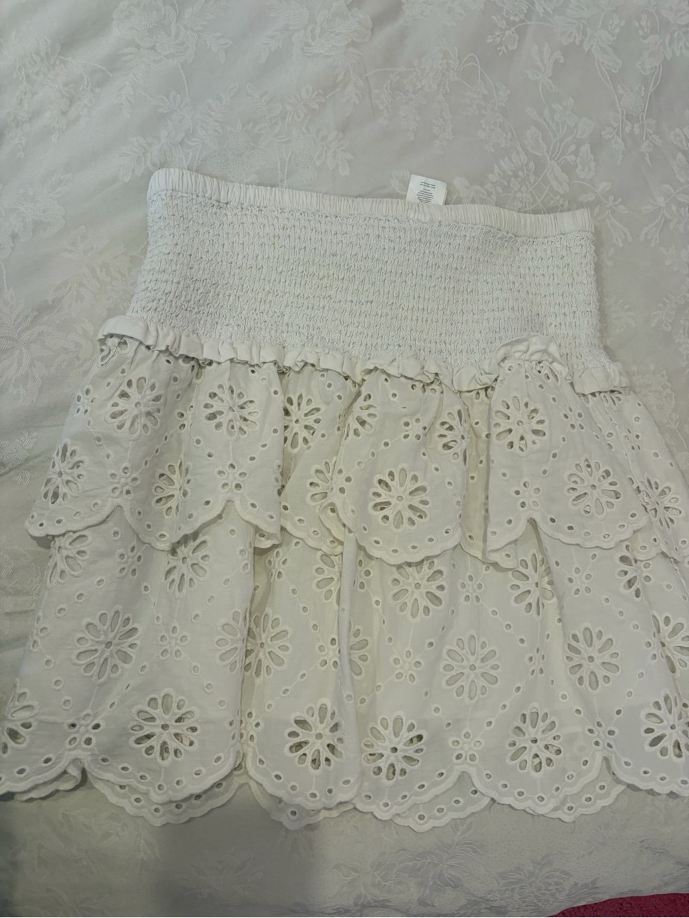 White skirt with flower details